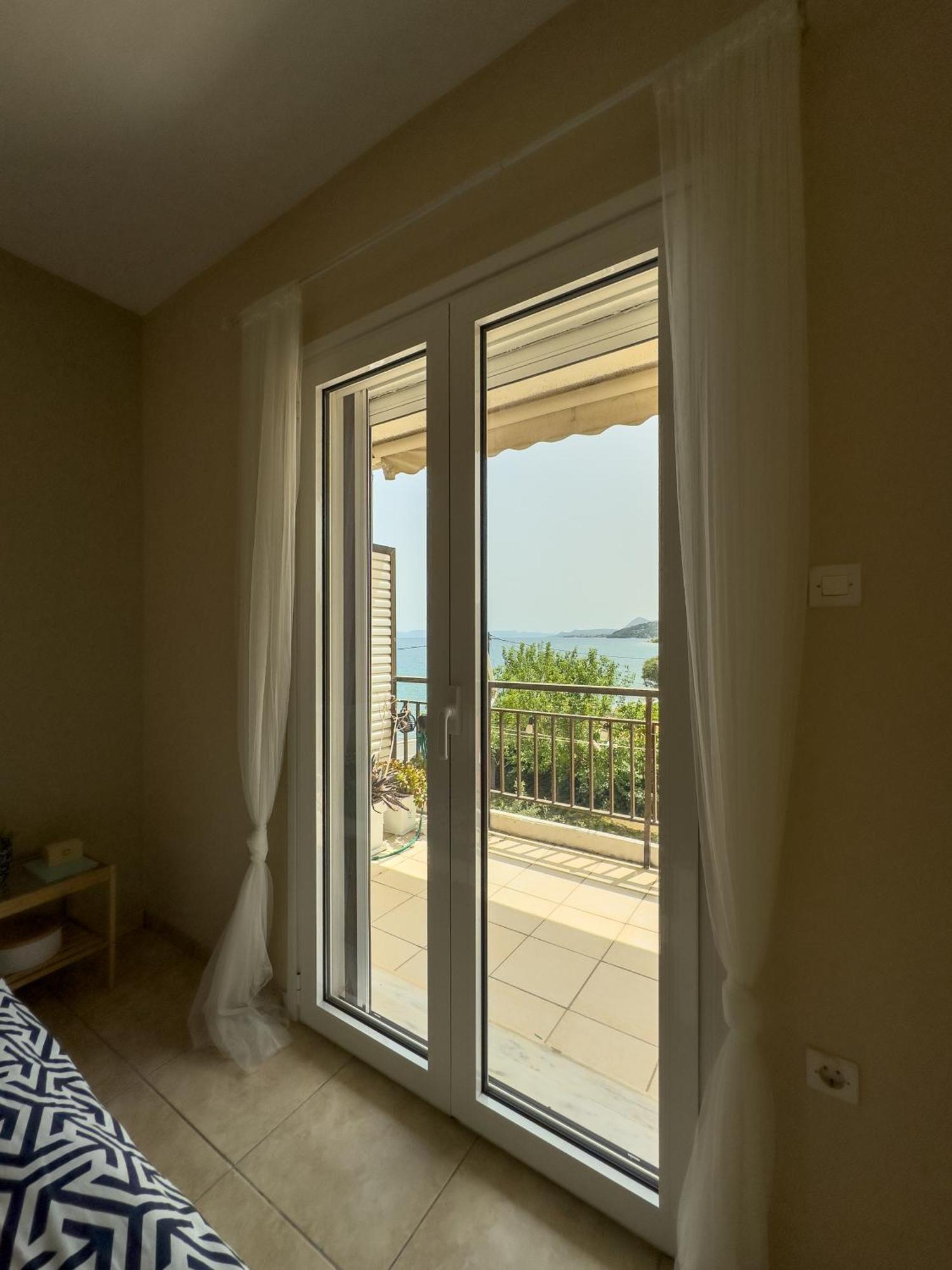 Thanos' Seaside Apartment โอโรโปส ภายนอก รูปภาพ